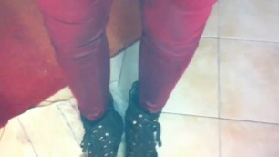 Girl pees and bathes in her red jeans and boots