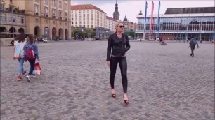 Caribig in shiny leggings and high heels Dresden public walk