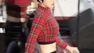 Korean girl dancing in tight leather pants.